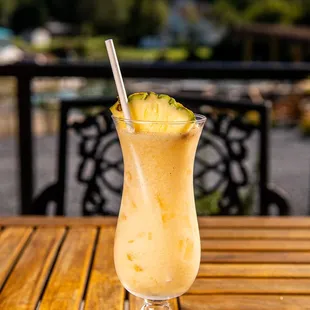 a tropical drink on a table
