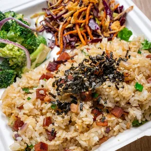 a tray of rice and broccoli