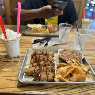 Fried ribs, baked beans, home made potato chips, banana pudding shake