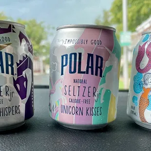 three cans of polar