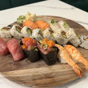 Sushi A  The chef choices sushi with spicy tuna roll. It is very reasonable price and the fish is fresh.