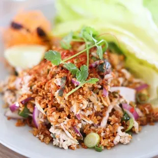 Yum Nam Kao Tod - Crispy rice salad. Choice of Tofu available.