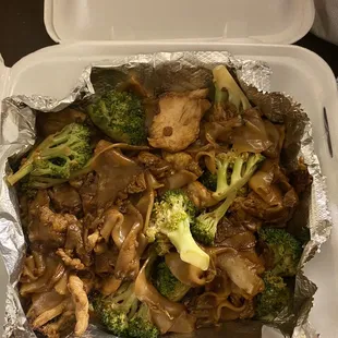 broccoli and mushrooms in a container