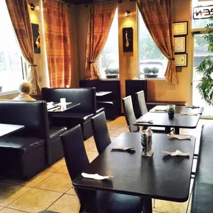 "Charming" corner booth for 2 by the window.