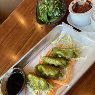 Dumplings and seaweed salad. So refreshing on a hot summer&apos;s day!