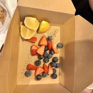 Fruit Cup Contents: Strawberries  Blueberries  Lemon Wedges (Mmmm)