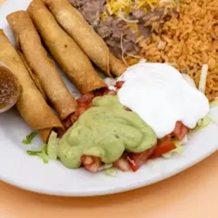 Taquitos salad beans and rice. Totally nasty burnt and over seasoned food.