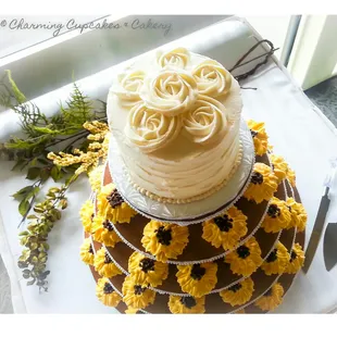 a cake decorated with yellow flowers