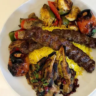 Lamb chops, saffron rice, grilled tomatoes, lamb koobieh, chicken kebab, beef shish kebab