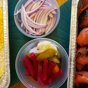 Side of onions and pickled veggies, served traditionally!