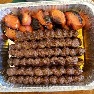 Lamb kebab with grilled tomatoes