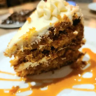 a piece of carrot cake on a plate