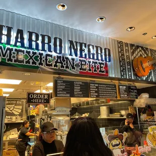 a mexican restaurant with customers