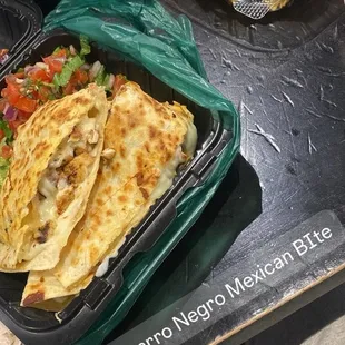 Chicken Quesadilla with chips and guacamole.