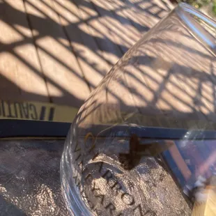 a glass of wine on a table