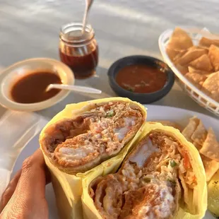 Amazing shrimp burrito extra spicy, so they brought me tons of amazing condiments