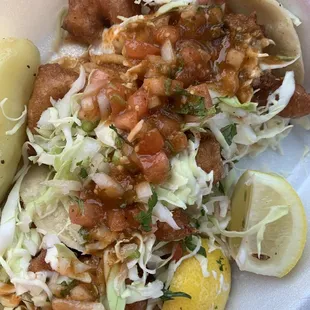 Shrimp tacos. I tried to take a picture of the carne asada tacos but my daughter went savage and ate them too fast.