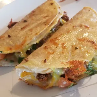 two quesadillas on a plate