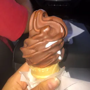 Soft served Banana ice cream dipped in chocolate.