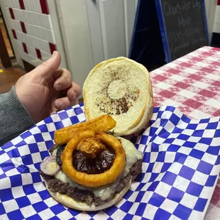 Onion ring Swiss burger maybe?  But really good