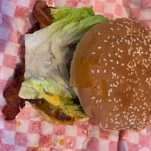 Bacon Cheeseburger with onions, tomatoes, lettuce, sauerkraut, &amp; jalapeños