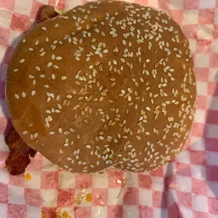 Bacon Cheeseburger with onions, tomatoes, lettuce, sauerkraut, &amp; jalapeños