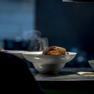 a man preparing food in a kitchen