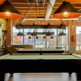 a pool table in the foreground