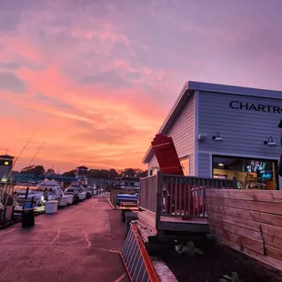 a view of a parking lot at sunset