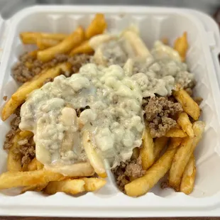 Cheesesteak on fries instead of bread (gluten allergy)