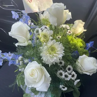 Half dozen white rose arrangement.