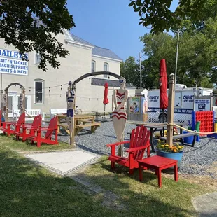 red chairs and tables in front of a building