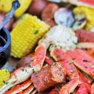 crab legs and corn on the cob