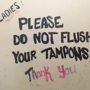 please don't flush your tampons thank you