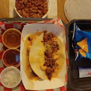 Mac-n-cheese brisket tacos, good stuff.  Beans were DRY, would pass on those!