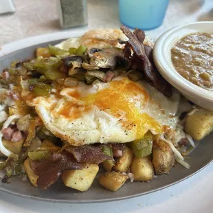 The Works Skillet with a side of Green Chile Pork sauce.