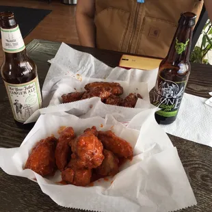 Soy sauce and hot wings with stone IPA and not your fathers ginger ale
