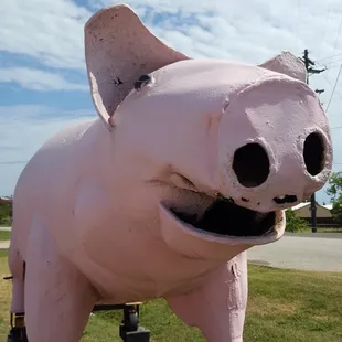 Big pink pig out front. You can't miss it.