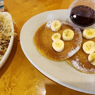Banana pancakes with side of hash browns
