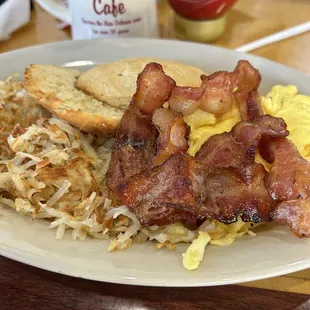 Eggs anyway you like it plus bacon and coffee.