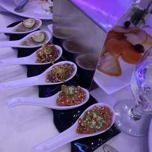 a row of plates of food