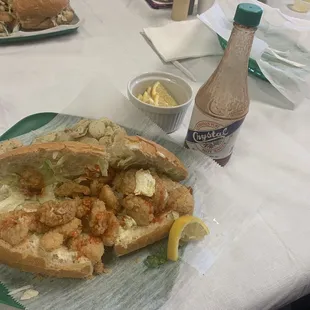 Shrimp Po&apos;Boy with fried pickles.