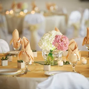 a table set for a wedding reception