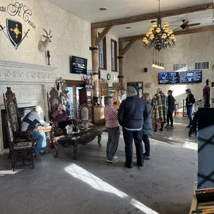 a group of people in a large room