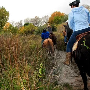 all participants enjoying the ride and a brief water crossing.