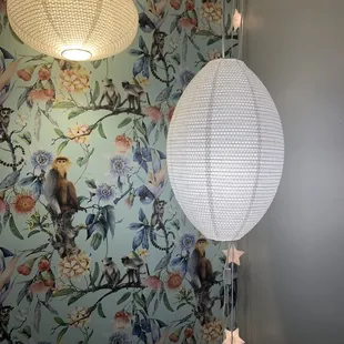 two lamps hanging from the ceiling