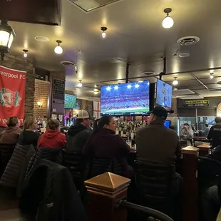 people sitting at a bar