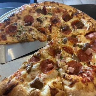 The Meaty Kuzola Pizza