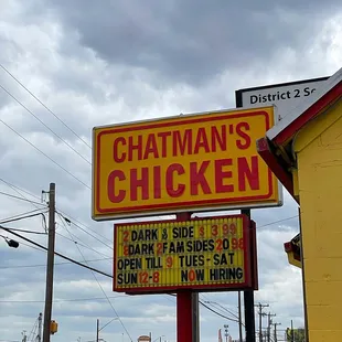 a yellow and red sign