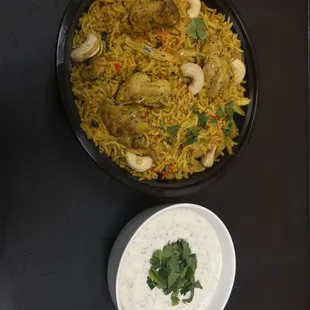 a bowl of rice and a bowl of yogurt